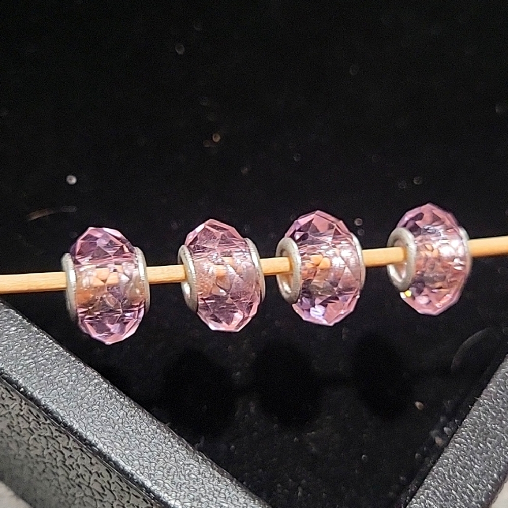 Set of 4 925 silver and glass charms/beads
